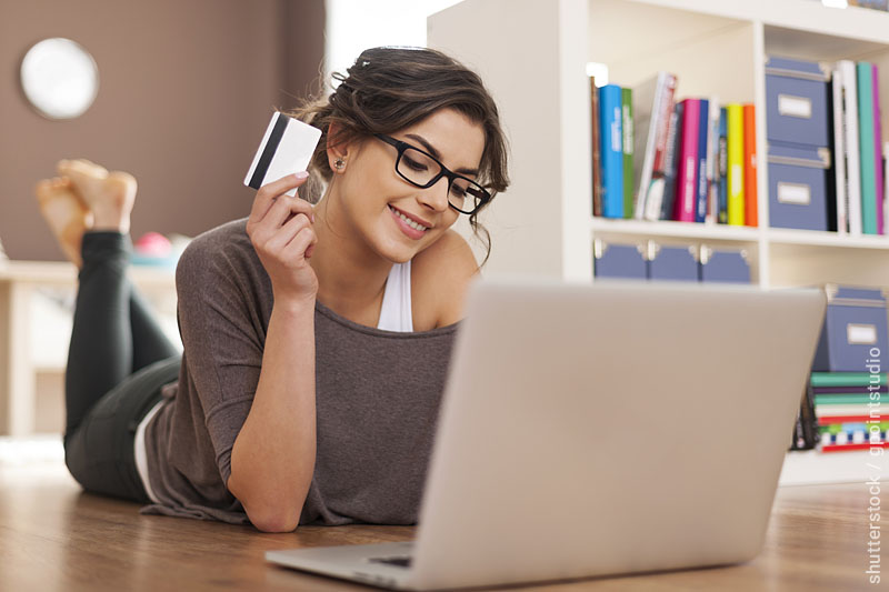 Girl while doing online shopping; illustration